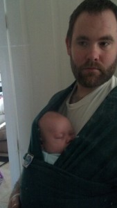 My husband, Rick, wearing Logan in the Moby wrap