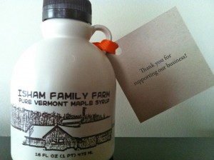 A plastic jug of Isham Family Farm maple syrup