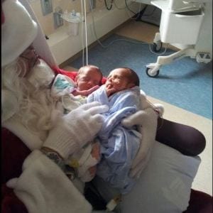 The first time they were allowed to touch each other was when Santa came to visit. Thank you March of Dimes!