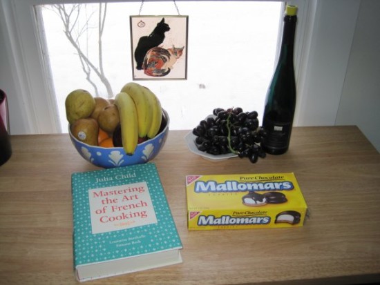 the infamous bowl of fruit. my father always liked taking weird pictures of things like mallomars next to julia child's cookbook.