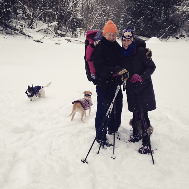 Couple outside in the winter of VT