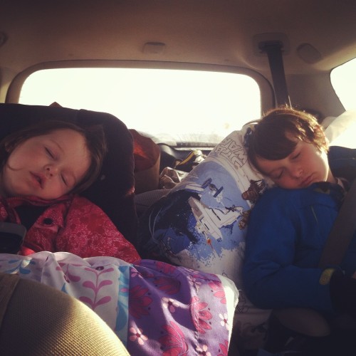 kids sleeping in car