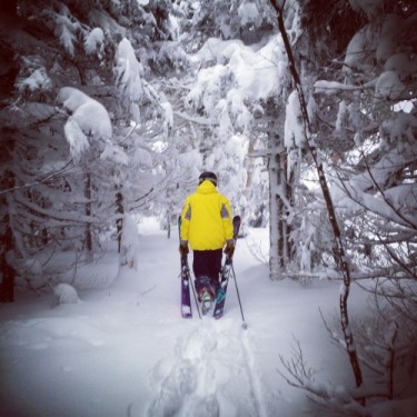 man skiing backcountry