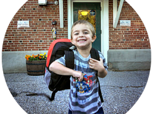 boy, backpack, brick wall