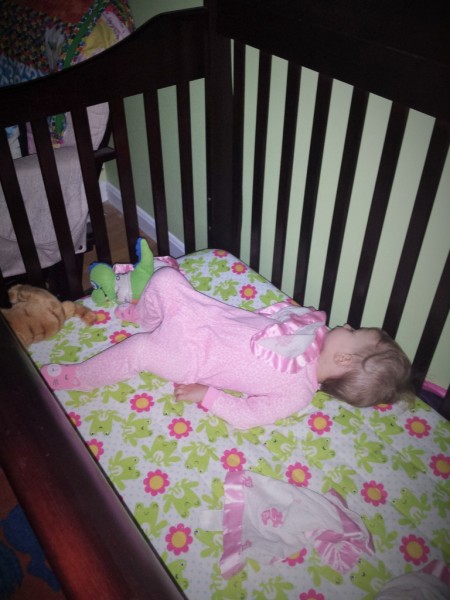 I snuck into Caroline's room last night to take this picture. When she first went to sleep her head was in the opposite direction!
