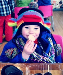 boy, colored beads, rainbow hat