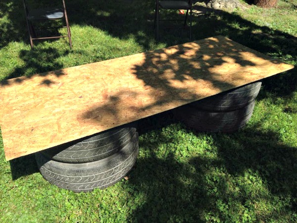 tires, plywood, table