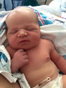 Beautiful baby boy on his day of birth.