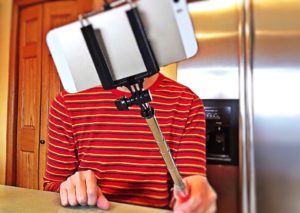 a selfie stick for the annual birthday interview