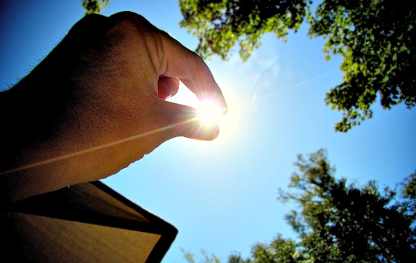 If I Could Turn Back Time: 5 Reasons to Love “Falling Back” sun, sky, hand, trees