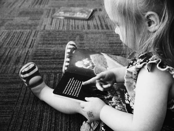 child reading a book