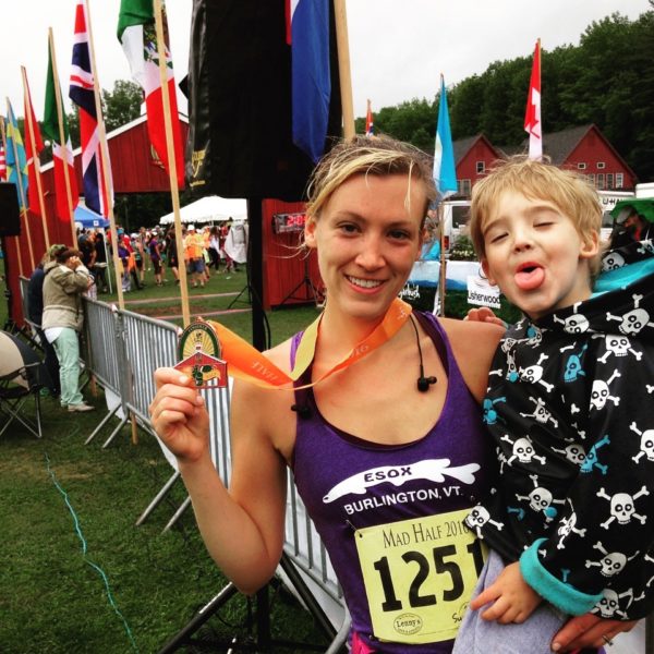 Mother Runner: How I Hit the Roads and Found My Inspiration Mother Runner with medal and son.