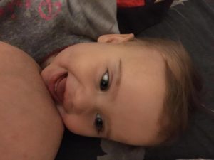 A Happy Fed Baby with her Wet Nurse