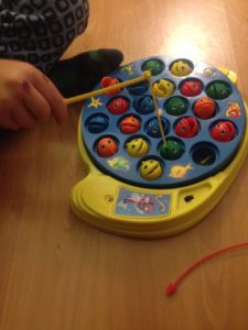 Board games promote motor skills and color recognition.