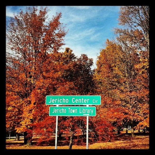 Exploring my Town of Jericho, Vermont Jericho Center sign with foliage and park in background