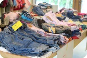 kids' clothes in a yard sale- great for sorting through and cleaning out closets.
