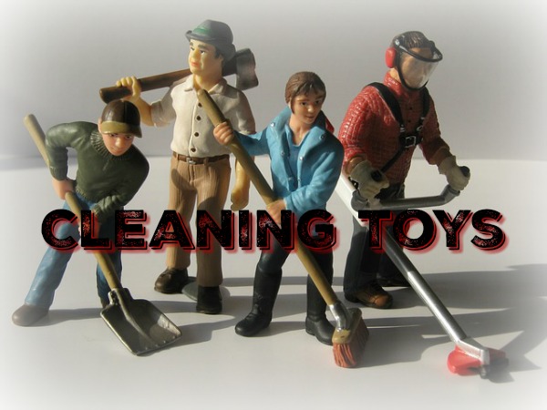 Cleaning Out Kids’ Toys Before the Holidays toy figurines with brooms and shovels