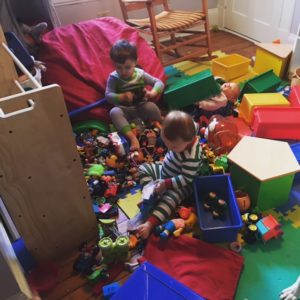 Tired moms still have to clean messy playrooms.