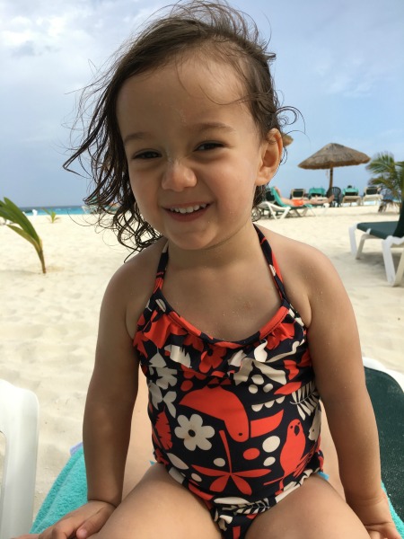 child, beach, relaxing after hearing mom voice