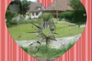 glass with a heart-shaped hole- broken heart for Valentine's Day
