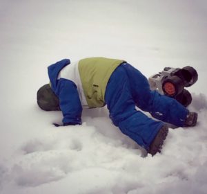 angry little person head in snow