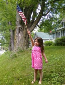 This flag-waving three year old will soon be entering double digit years.