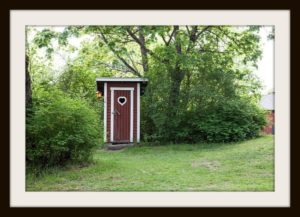 red outhouse for people with stress incontinence
