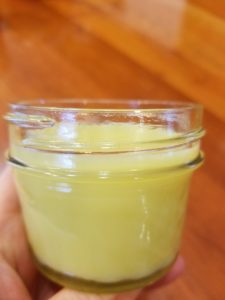 Finished product: homemade eczema lotion in a jar.