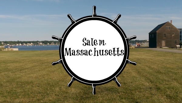 Weekend Getaway – Salem, Massachusetts ship's wheel with Salem, Massachusetts in the background