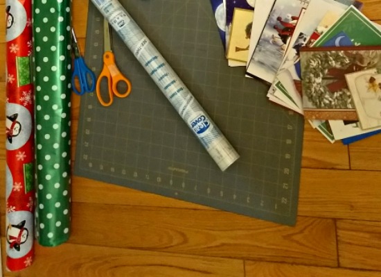 Holiday Placemats: A DIY Project To Recycle and Reuse Holiday Cards materials to make the holiday placemat