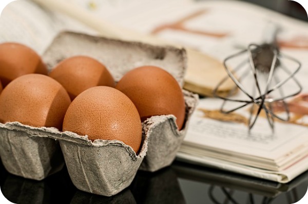 eggs and a whisk for baking pumpkin treats