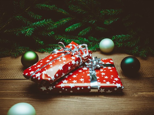 Baby Gifts for the Holidays: What to Consider Beyond Toys Wrapped baby gifts