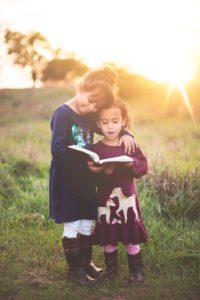 girls, sisters, reading, chapter book