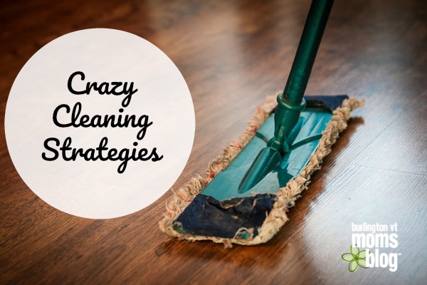 Crazy Cleaning Strategies for Crazy Messy Households a mop on a wood floor and the words "crazy cleaning strategies"