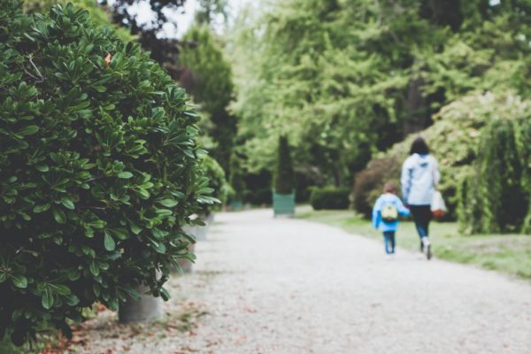 mom and child walking, path, walk outdoors, holding hands