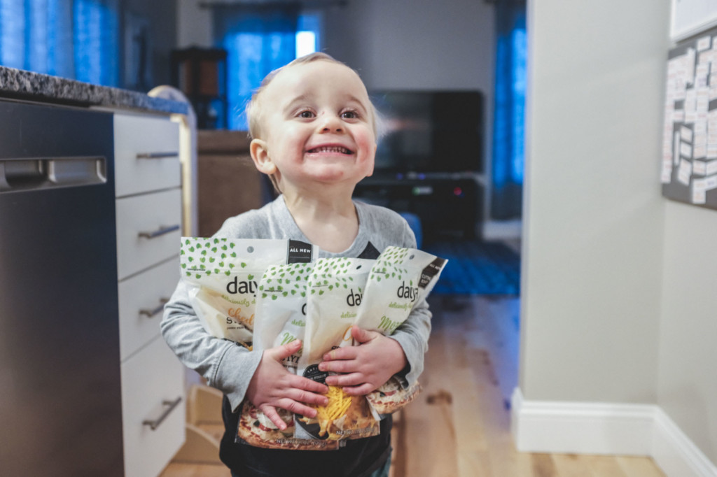 toddler excited to have allergy-friendly cheese
