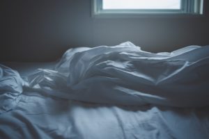 crumpled bed sheets