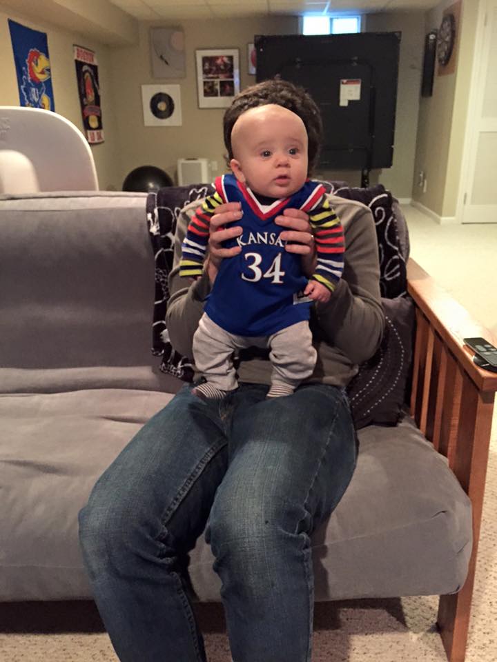 ollie enjoying his first taste of march madness cheering on the jayhawks