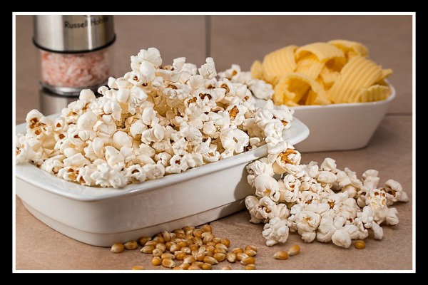 popcorn and potato chips in bowls