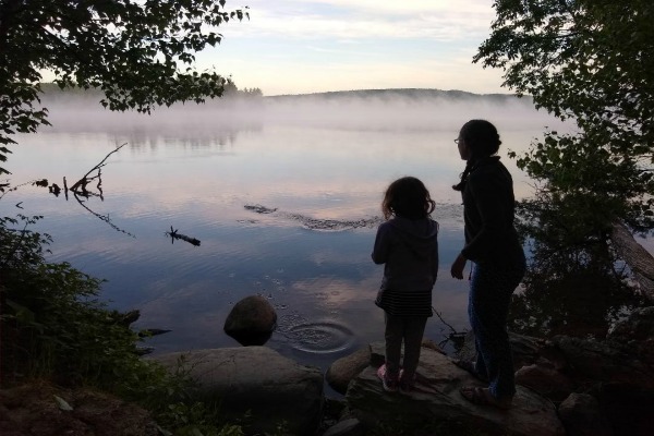 Kids Camping- What to Bring for an Enjoyable (Whine-Free) Trip mom and daughter skipping stones