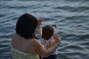 mother and daughter, swimming, water, bathing suits