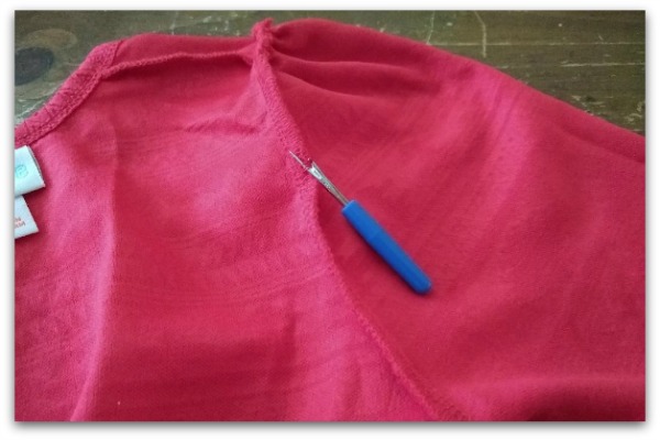 a seam ripper used on a dress