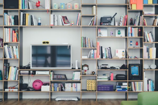 I Am Not a True Crime Mom. Lighter Fare for a Lighter Heart. television and built in bookcases filled with books