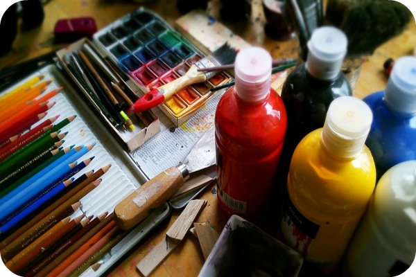 paint, brushes, colored pencils