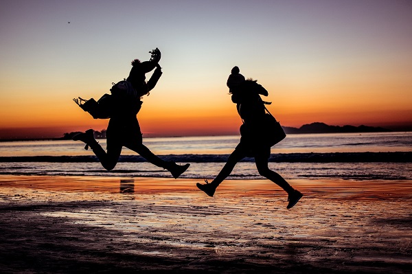 coping with loss, friendship loss, making friends, keeping friends, adult friends, sunset, women, friends, jumping