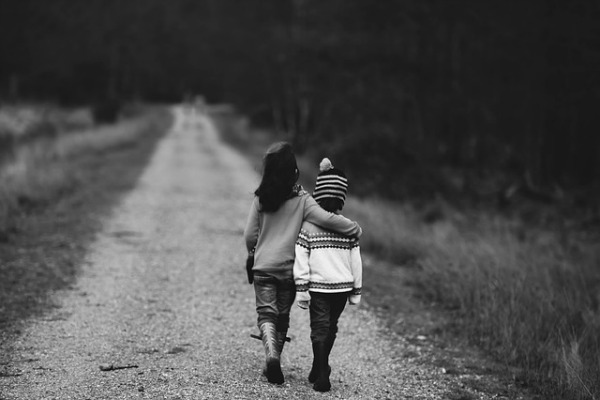 Fostering Independent Kids – Building Life Skills for the Future independent kids walking on a dirt path