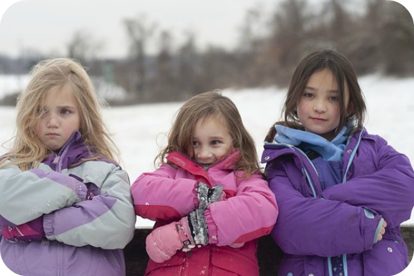 3 girls in winter coats