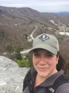 woman in hat, selfie on mountain trail