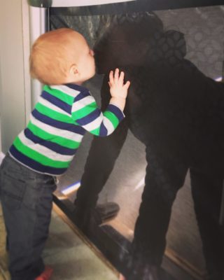 baby kissing stairs