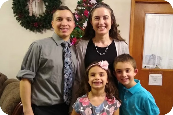 a husband, wife, and 2 children